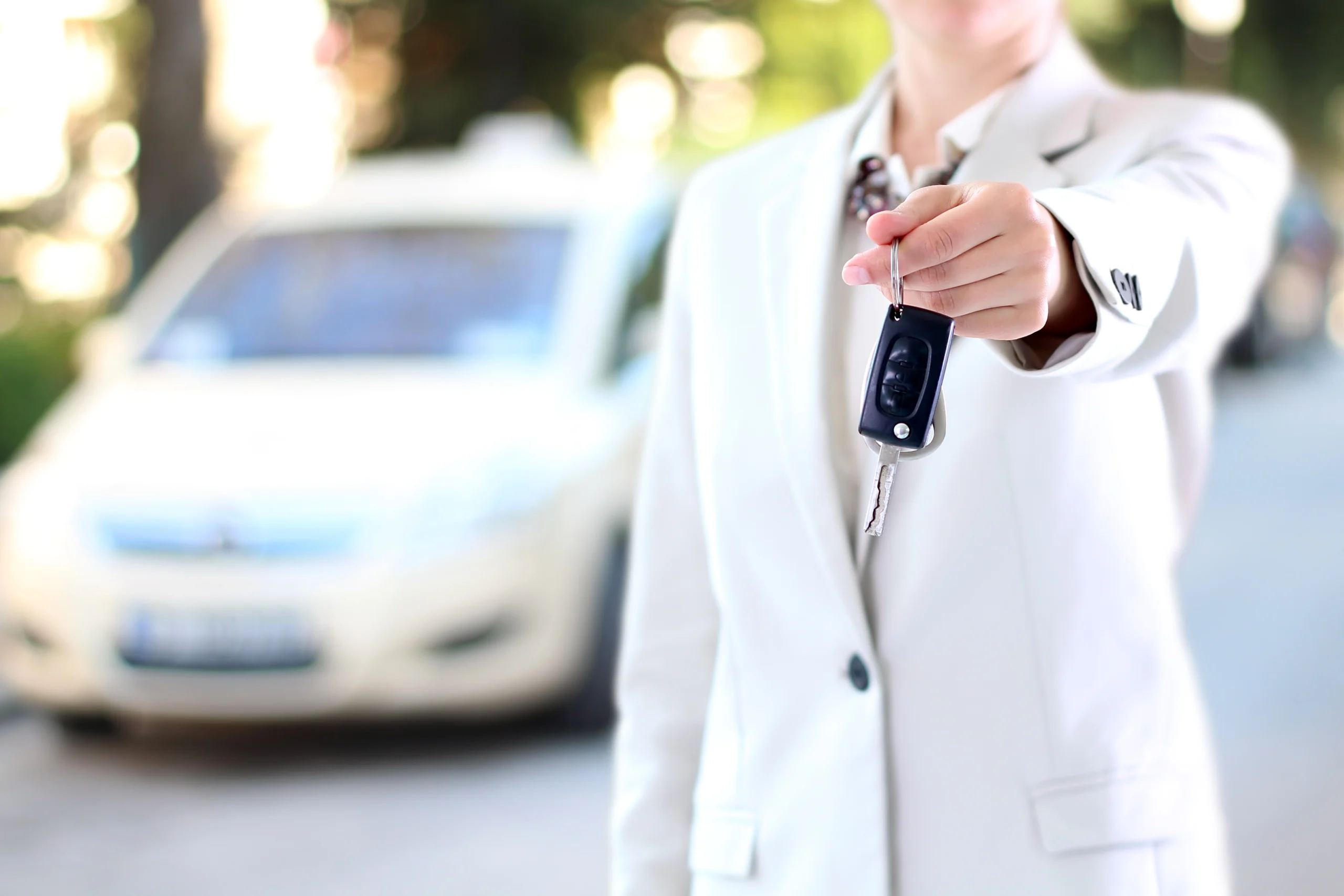 man with car key